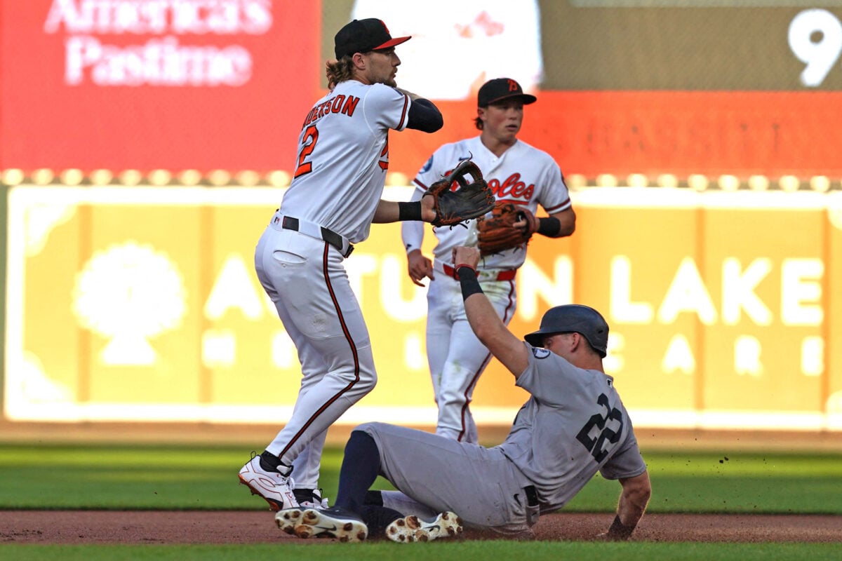 Aug 19, 2026; Baltimore, Maryland, USA; New York Yankees designated hitter Ben Rice (22) forced out on the front end of a first inning double play by Baltimore Orioles shortstop Gunnar Henderson (2) at Oriole Park at Camden Yards. Mandatory Credit: Mitch Stringer-Imagn Images