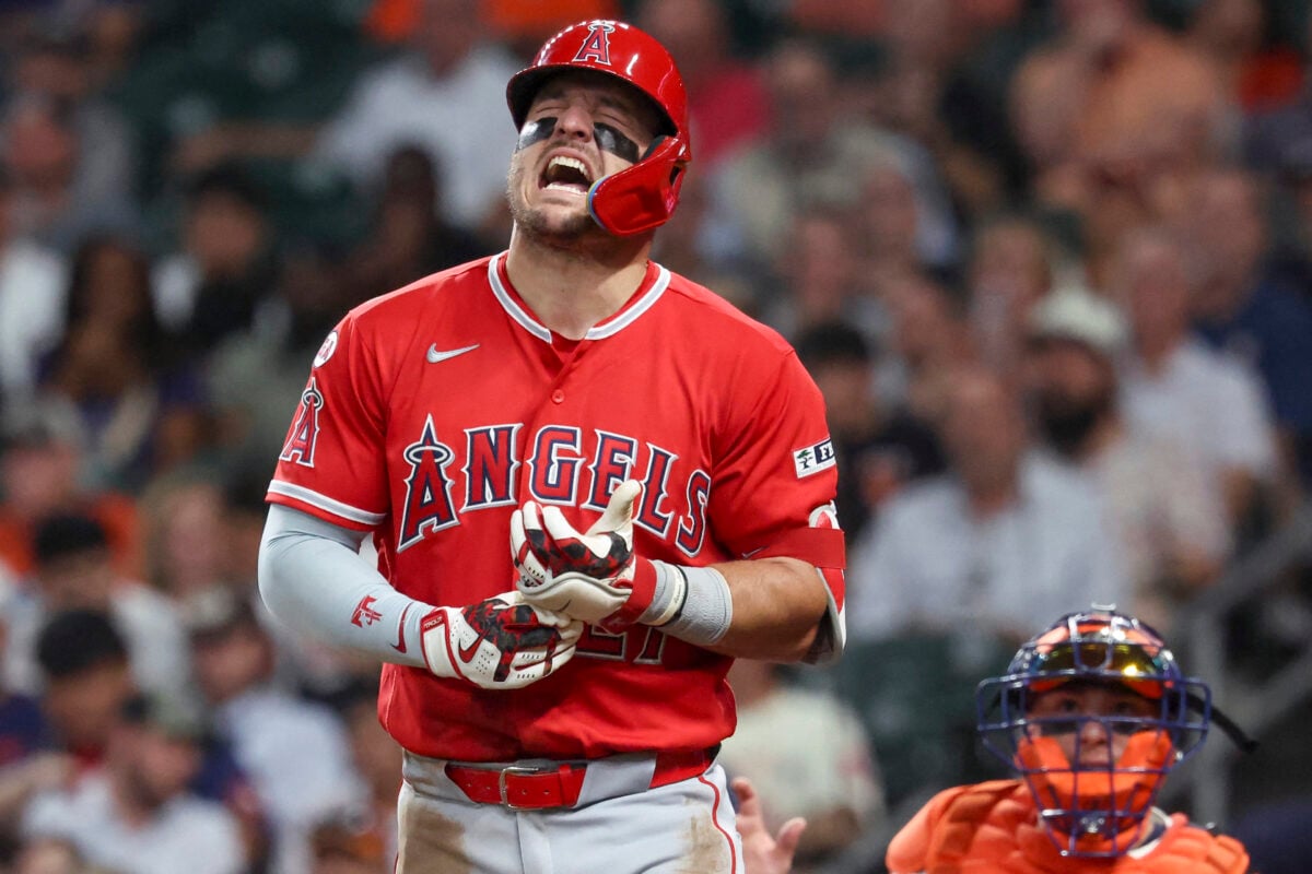 Aug 19, 2026; Houston, Texas, USA; Los Angeles Angels center fielder Mike Trout (27) reacts after being hit by a pitch during the third inning against the Houston Astros at Daikin Park. Mandatory Credit: Troy Taormina-Imagn Images