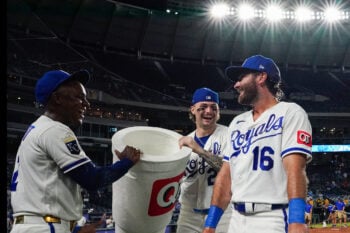 Aug 19, 2026; Kansas City, Missouri, USA; Kansas City Royals right fielder John Rave (16) is doused by left fielder Tyler Tolbert (2) and catcher Carter Jensen (22) after the win over the Athletics at Kauffman Stadium. Mandatory Credit: Denny Medley-Imagn Images