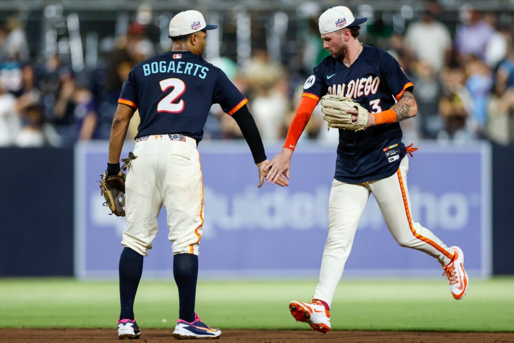 Aug 21, 2026; San Diego, California, USA;  San Diego Padres center fielder Jackson Merrill (3) celebrates with shortstop Xander Bogaerts (2) after defeating the Minnesota Twins at Petco Park.  Mandatory Credit: David Frerker-Imagn Images