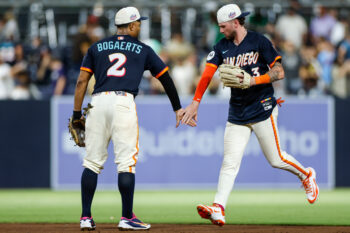 Aug 21, 2026; San Diego, California, USA;  San Diego Padres center fielder Jackson Merrill (3) celebrates with shortstop Xander Bogaerts (2) after defeating the Minnesota Twins at Petco Park.  Mandatory Credit: David Frerker-Imagn Images