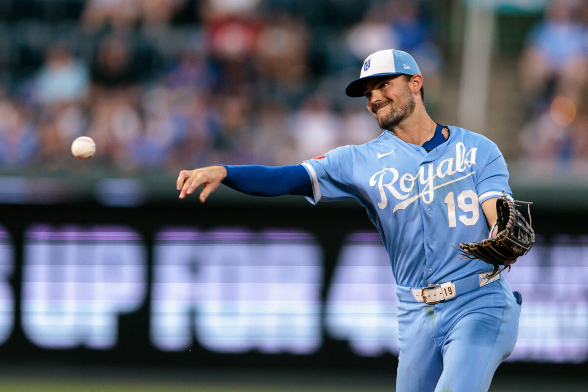Aug 22, 2026; Kansas City, Missouri, USA; Kansas City Royals second baseman Michael Massey (19) throws to first base during the seventh inning against the Detroit Tigers at Kauffman Stadium. Mandatory Credit: William Purnell-Imagn Images