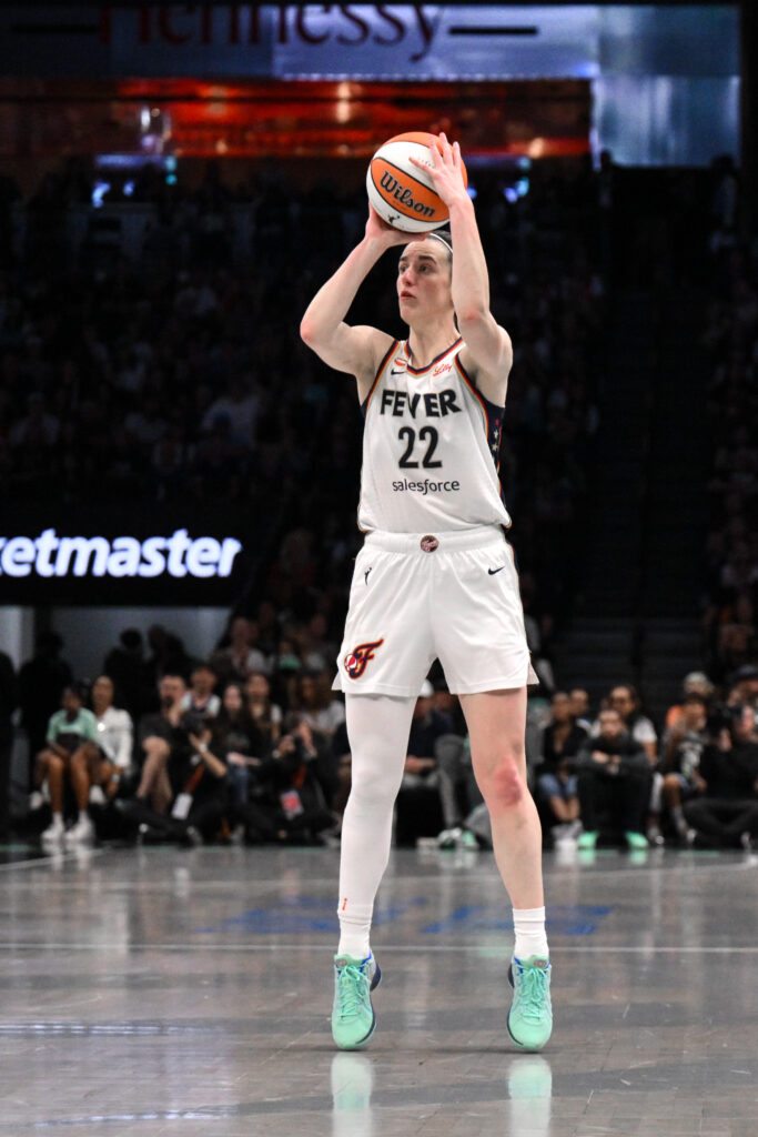 Aug 22, 2026; Brooklyn, New York, USA;  Indiana Fever guard Caitlin Clark (22) shoots the ball against the New York Liberty during the second half at Barclays Center.  Mandatory Credit: John Jones-Imagn Images