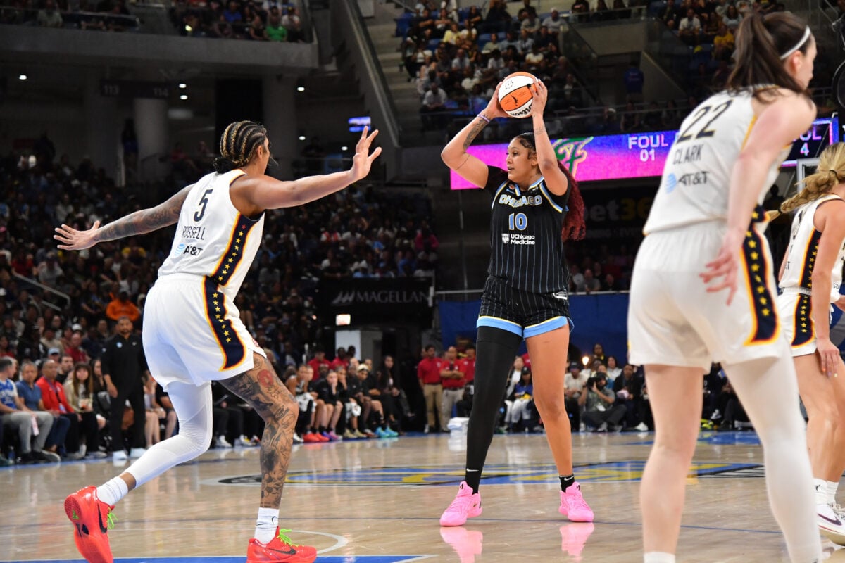 Aug 23, 2026; Chicago, Illinois, USA;  Chicago Sky center Kamilla Cardoso (10) controls the ball against Indiana Fever center Mercedes Russell (5) during the second half at Wintrust Arena.  Mandatory Credit: Patrick Gorski-Imagn Images