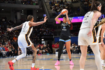 Aug 23, 2026; Chicago, Illinois, USA;  Chicago Sky center Kamilla Cardoso (10) controls the ball against Indiana Fever center Mercedes Russell (5) during the second half at Wintrust Arena.  Mandatory Credit: Patrick Gorski-Imagn Images
