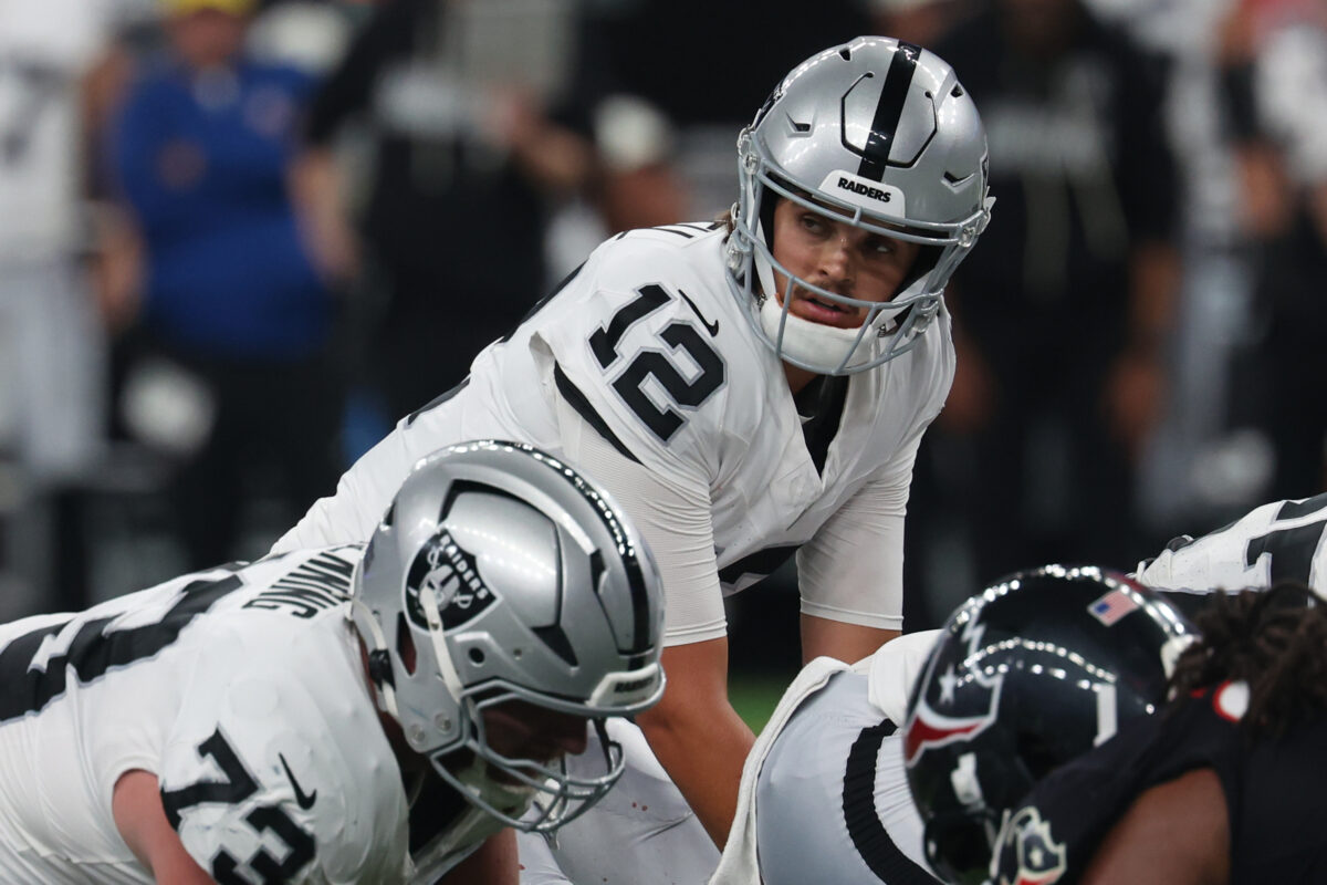 Aug 20, 2026; Houston, Texas, USA; Las Vegas Raiders quarterback Aidan O'Connell (12) under center against the Houston Texans in second half at Reliant Stadium. Mandatory Credit: Thomas Shea-Imagn Images