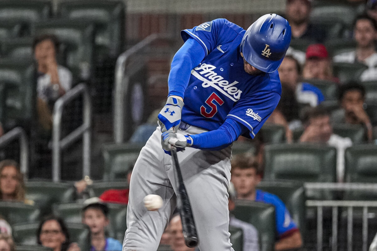 Aug 27, 2026; Cumberland, Georgia, USA; Los Angeles Dodgers first baseman Freddie Freeman (5) singles against the Atlanta Braves during the ninth inning at Truist Park. Mandatory Credit: Dale Zanine-Imagn Images