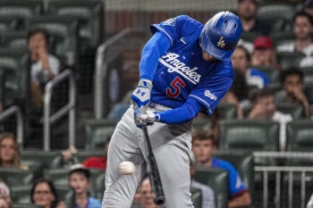 Aug 27, 2026; Cumberland, Georgia, USA; Los Angeles Dodgers first baseman Freddie Freeman (5) singles against the Atlanta Braves during the ninth inning at Truist Park. Mandatory Credit: Dale Zanine-Imagn Images