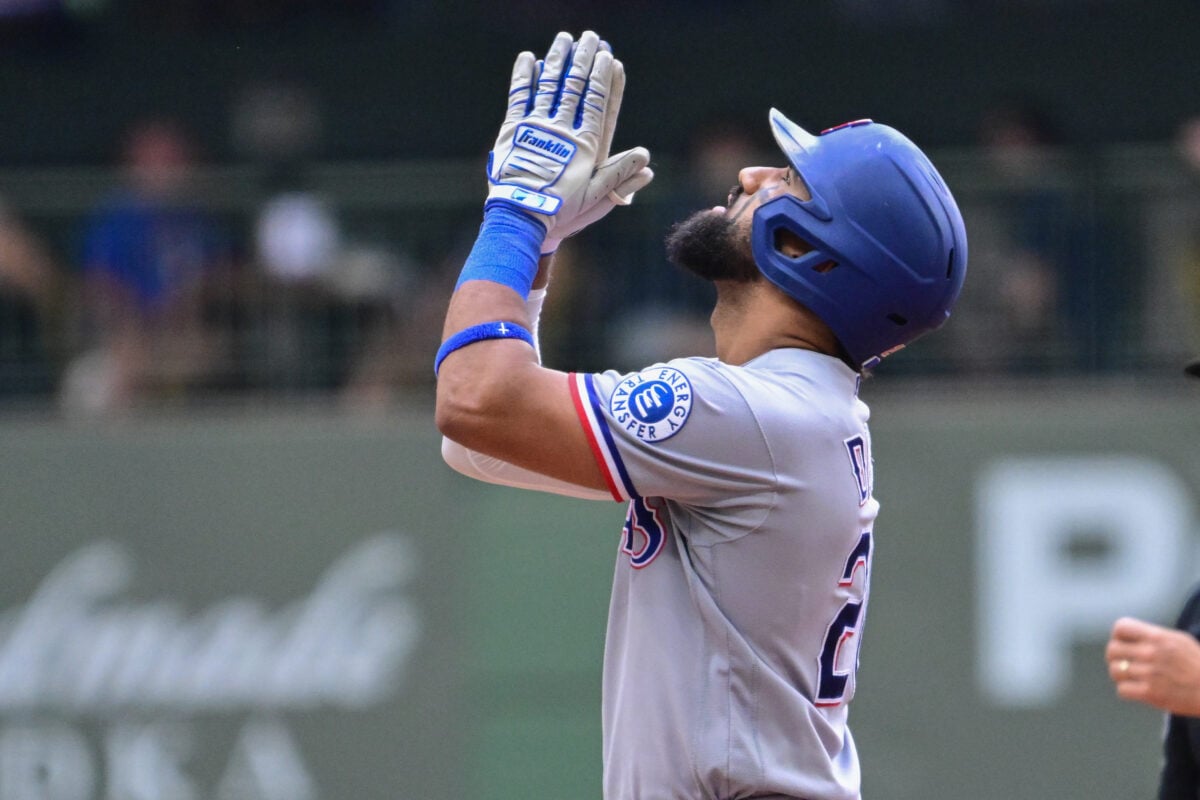 Aug 30, 2026; Milwaukee, Wisconsin, USA;  Texas Rangers center fielder Ezequiel Duran (20) reacts after hitting a double to drive in two runs in the fifth inning against the Milwaukee Brewers at American Family Field.  Mandatory Credit: Benny Sieu-Imagn Images