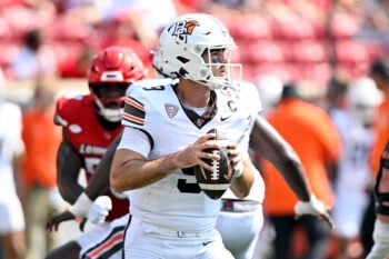 Sep 20, 2025; Louisville, Kentucky, USA;  Bowling Green Falcons quarterback Drew Pyne (9) looks to pass against the Louisville Cardinals during the second half at L&N Federal Credit Union Stadium. Louisville defeated Bowling Green 40-17. Mandatory Credit: Jamie Rhodes-Imagn Images