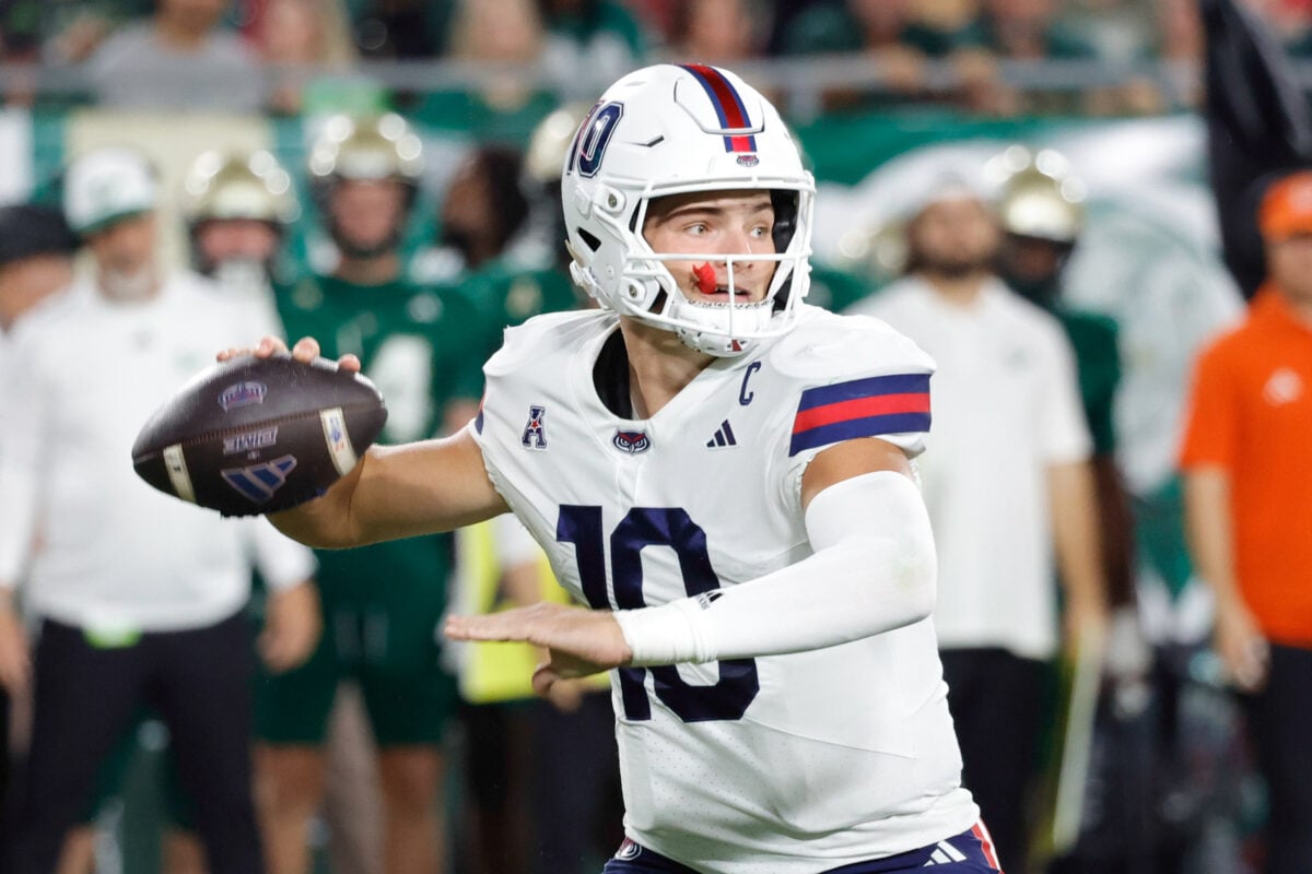 Oct 18, 2025; Tampa, Florida, USA;   Florida Atlantic Owls quarterback Caden Veltkamp (10) throws a pass during the second quarter against the South Florida Bulls at Raymond James Stadium. Mandatory Credit: Reinhold Matay-Imagn Images