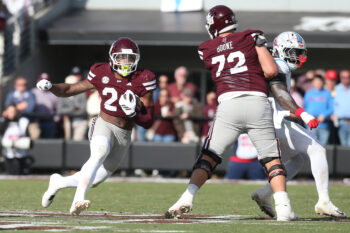 Nov 28, 2025; Starkville, Mississippi, USA; Mississippi State Bulldogs running back Fluff Bothwell (24) runs against the Mississippi Rebels in the second half  at Davis Wade Stadium at Scott Field. Mandatory Credit: Petre Thomas-Imagn Images