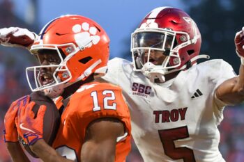 Clemson Tigers wide receiver Bryant Wesco Jr. (12) catches a pass for a touchdown while being defended by Troy Trojans cornerback Kaleno Levine (5) Saturday, Sept. 6, 2025 during the NCAA football game at Memorial Stadium in Clemson, South Carolina.