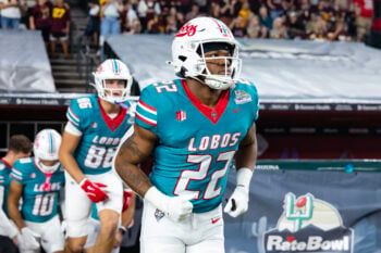 Dec 26, 2025; Phoenix, AZ, USA; New Mexico Lobos running back Scottre Humphrey (22) against the Minnesota Golden Gophers during the Rate Bowl at Chase Field. Mandatory Credit: Mark J. Rebilas-Imagn Images