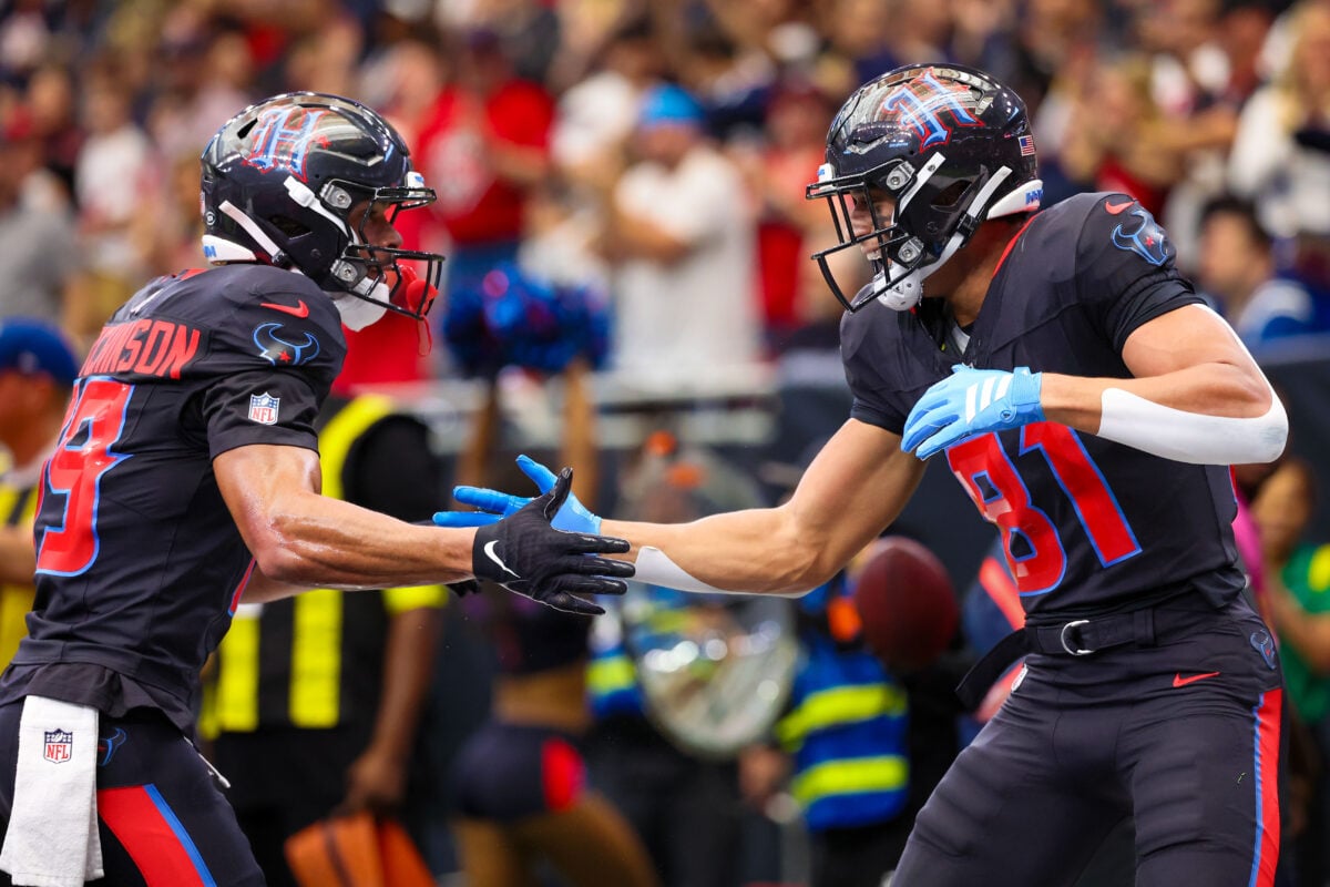 Jan 4, 2026; Houston, Texas, USA; Houston Texans wide receiver Xavier Hutchinson (19) celebrates wide receiver Jayden Higgins (81) touchdown reception against the Indianapolis Colts in the first half at NRG Stadium. Mandatory Credit: Thomas Shea-Imagn Images