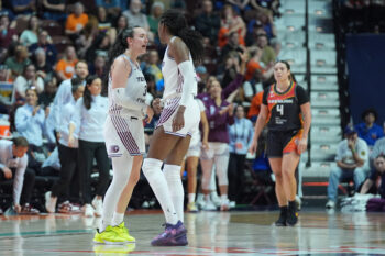 Jun 19, 2026; Uncasville, Connecticut, USA; Toronto Tempo guard Marina Mabrey (3) and center Temi Fagbenle (14) react to a basket against the Connecticut Sun during the second half at Mohegan Sun Arena. Mandatory Credit: Gregory Fisher-Imagn Images