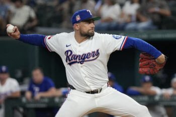 Jul 25, 2026; Arlington, Texas, USA; Texas Rangers pitcher Nathan Eovaldi (17) delivers a pitch to the Seattle Mariners during the first inning at Globe Life Field. Mandatory Credit: Jim Cowsert-Imagn Images