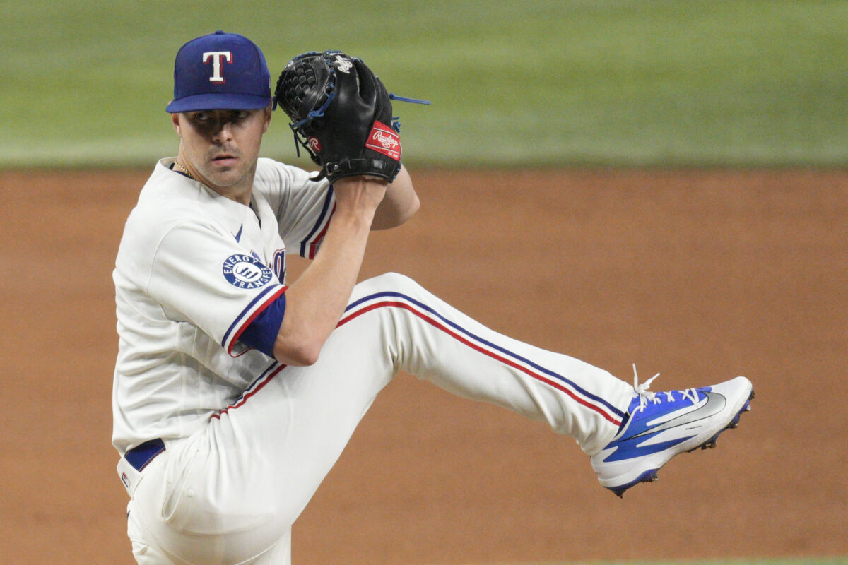 Aug 4, 2026; Arlington, Texas, USA; Texas Rangers pitcher MacKenzie Gore (1) goes into the windup against the San Francisco Giants during the sixth inning at Globe Life Field. Mandatory Credit: Raymond Carlin III-Imagn Images