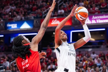 Aug 6, 2026; Indianapolis, Indiana, USA;  Las Vegas Aces center A'ja Wilson (22) shoots the ball against Indiana Fever center Aliyah Boston (7) in the second half at Gainbridge Fieldhouse. Mandatory Credit: Trevor Ruszkowski-Imagn Images