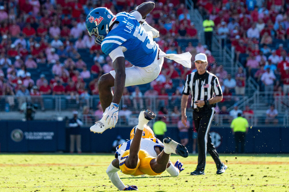 Ole Miss running back Kewan Lacy (5) jumps over a defender during a college football game between Ole Miss and LSU at Vaught-Hemingway Stadium in Oxford, Miss., on Saturday, Sept. 27, 2025. Ole Miss defeated LSU 24-19.