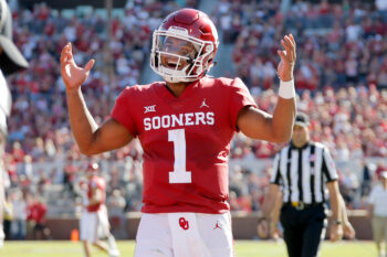 Oklahoma's Kyler Murray (1) smiles after throwing a touchdown pass during a college football game between the University of Oklahoma Sooners (OU) and the Kansas State Wildcats at Gaylord Family-Oklahoma Memorial Stadium in Norman, Okla., Saturday, Oct. 27, 2018.
