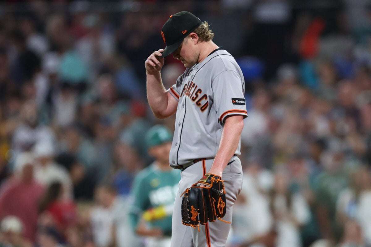 Aug 21, 2026; Boston, Massachusetts, USA; San Francisco Giants starting pitcher Logan Webb (62) reacts during the third inning against the Boston Red Sox at Fenway Park. Mandatory Credit: Paul Rutherford-Imagn Images
