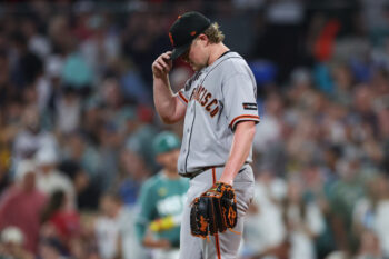Aug 21, 2026; Boston, Massachusetts, USA; San Francisco Giants starting pitcher Logan Webb (62) reacts during the third inning against the Boston Red Sox at Fenway Park. Mandatory Credit: Paul Rutherford-Imagn Images