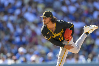 Aug 22, 2026; Los Angeles, California, USA; Pittsburgh Pirates pitcher Jared Jones (17) pitches during the first inning at Dodger Stadium. Mandatory Credit: Jayne Kamin-Oncea-Imagn Images