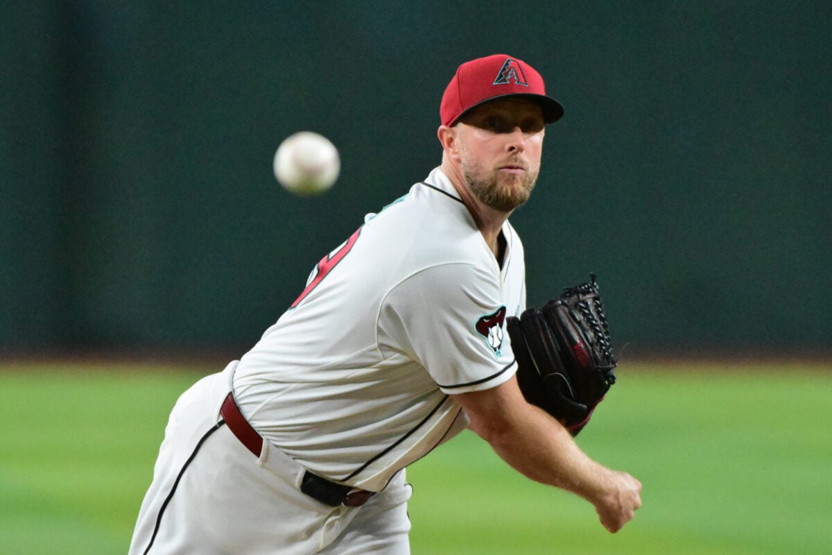 Aug 12, 2026; Phoenix, Arizona, USA;  Arizona Diamondbacks pitcher Merrill Kelly (29) throws a pitch in the first inning against the Colorado Rockies at Chase Field.  Mandatory Credit: Matt Kartozian-Imagn Images