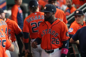 Aug 21, 2026; Houston, Texas, USA; Houston Astros center fielder Taylor Trammell (26) walks through the dugout before playing against the Athletics at Daikin Park. Mandatory Credit: Thomas Shea-Imagn Images