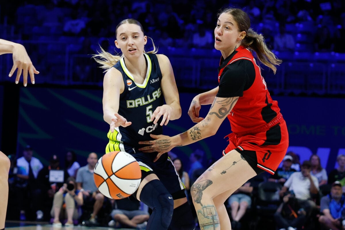 Aug 25, 2026; Arlington, Texas, USA;  Dallas Wings guard Paige Bueckers (5) makes a pass against Portland Fire forward Emily Engstler (21) during the first half at College Park Center.  Mandatory Credit: Chris Jones-Imagn Images