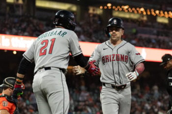 Aug 28, 2026; San Francisco, California, USA;  Arizona Diamondbacks right fielder Corbin Carroll (7) celebrates with Arizona Diamondbacks left fielder Lars Nootbaar (21) after hitting a two-run home run during the third inning against the San Francisco Giants at Oracle Park.  Mandatory Credit: Stan Szeto-Imagn Images