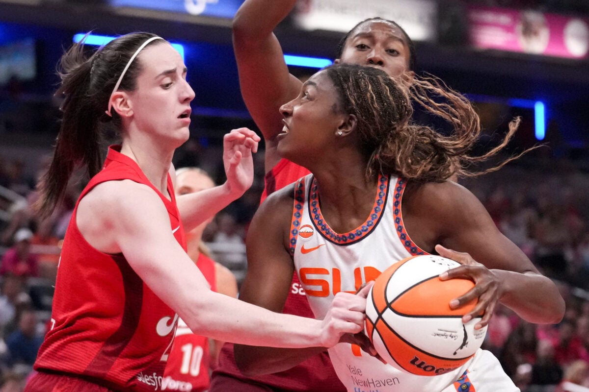 Indiana Fever guard Caitlin Clark (22) defends Connecticut Sun forward Diamond Miller (1) as she looks to shoot during a game on Friday, Aug. 28, 2026, at Gainbridge Fieldhouse in Indianapolis. The Fever defeated the Sun 111-91.
