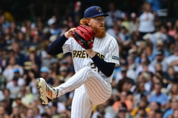 Aug 30, 2026; Milwaukee, Wisconsin, USA;  Milwaukee Brewers pitcher Dustin May (21) throws a pitch in the first inning against the Texas Rangers at American Family Field.  Mandatory Credit: Benny Sieu-Imagn Images