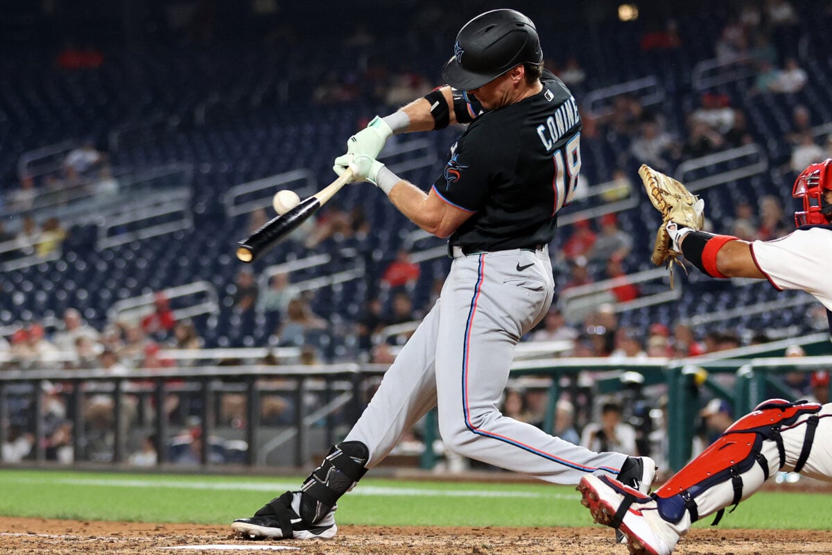 Aug 31, 2026; Washington, District of Columbia, USA; Miami Marlins right fielder Griffin Conine (18) hits a single during the eighth inning against the Washington Nationals at Nationals Park. Mandatory Credit: Daniel Kucin Jr.-Imagn Images
