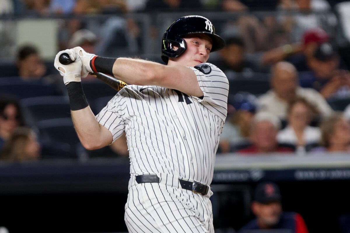 Aug 28, 2026; Bronx, New York, USA; New York Yankees designated hitter Ben Rice (22) hits a single against the Boston Red Sox during the seventh inning at Yankee Stadium. Mandatory Credit: Tom Horak-Imagn Images