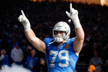 Detroit Lions defensive end John Cominsky is introduced before the Green Bay Packers game at Ford Field in Detroit on Thursday, Nov. 23, 2023.