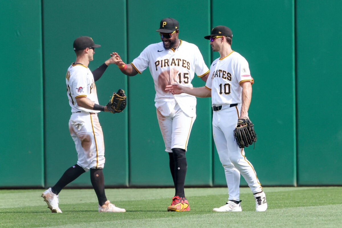 Sep 3, 2026; Pittsburgh, Pennsylvania, USA; Pittsburgh Pirates left fielder Jake Mangum (left), center fielder Oneil Cruz (15), and right fielder Bryan Reynolds (10) celebrate in the outfield after defeating the San Francisco Giants at PNC Park. Mandatory Credit: Charles LeClaire-Imagn Images