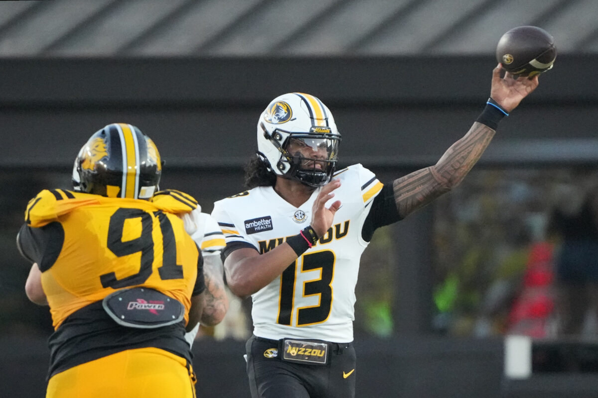 Sep 3, 2026; Columbia, Missouri, USA;  Missouri Tigers quarterback Austin Simmons (13) throws a pass against the Arkansas-Pine Bluff Golden Lions during the first half at Faurot Field at Memorial Stadium.  Mandatory Credit: Denny Medley-Imagn Images