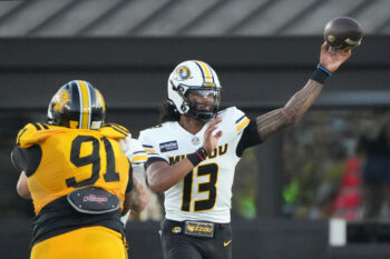Sep 3, 2026; Columbia, Missouri, USA;  Missouri Tigers quarterback Austin Simmons (13) throws a pass against the Arkansas-Pine Bluff Golden Lions during the first half at Faurot Field at Memorial Stadium.  Mandatory Credit: Denny Medley-Imagn Images