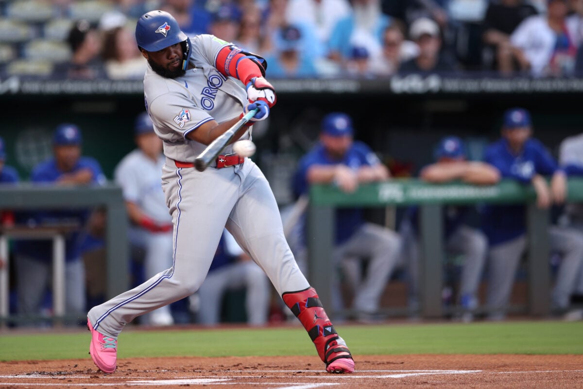 Sep 4, 2026; Kansas City, Missouri, USA; Toronto Blue Jays first base Vladimir Guerrero Jr. (27) hits a single during the first inning against the Kansas City Royals at Kauffman Stadium. Mandatory Credit: William Purnell-Imagn Images