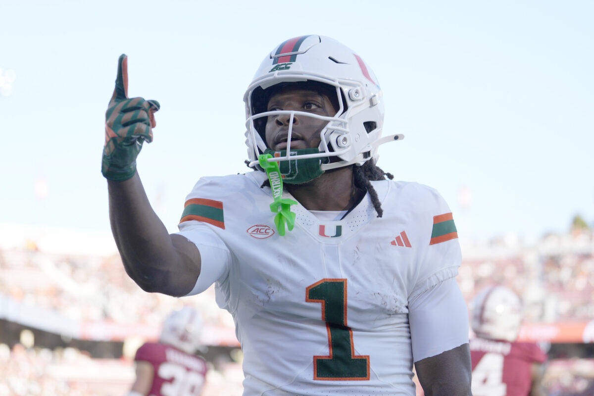 Sep 4, 2026; Stanford, California, USA;  Miami Hurricanes wide receiver Malachi Toney (1) reacts towards the stands after scoring a touchdown against the Stanford Cardinal during the first quarter at Stanford Stadium.  Mandatory Credit: Stan Szeto-Imagn Images