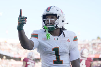 Sep 4, 2026; Stanford, California, USA;  Miami Hurricanes wide receiver Malachi Toney (1) reacts towards the stands after scoring a touchdown against the Stanford Cardinal during the first quarter at Stanford Stadium.  Mandatory Credit: Stan Szeto-Imagn Images