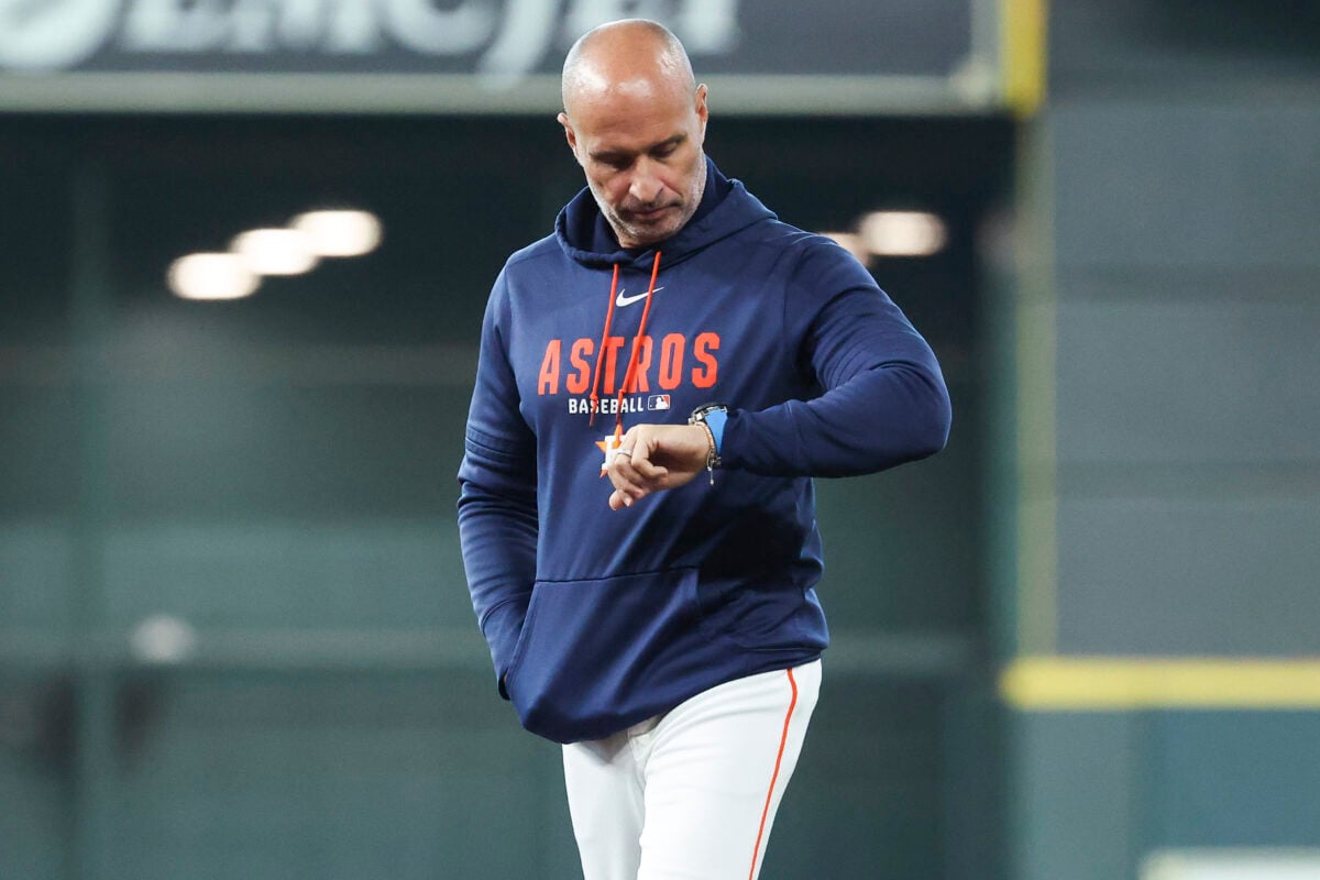 Sep 4, 2026; Houston, Texas, USA; Houston Astros manager Joe Espada looks at his watch before the game against the Arizona Diamondbacks at Daikin Park. Mandatory Credit: Troy Taormina-Imagn Images