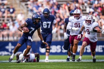 Sep 5, 2026; East Hartford, Connecticut, USA;  UConn Huskies quarterback Kalieb Osborne (7) runs the ball against the Lafayette Leopards in the second quarter at Pratt & Whitney Stadium at Rentschler Field. Mandatory Credit: David Butler II-Imagn Images