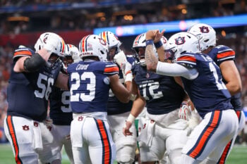 Sep 5, 2026; Atlanta, Georgia, USA; Auburn Tigers running back Jeremiah Cobb (23) celebrates with teammates after a touchdown run against the Baylor Bears in the second quarter at Mercedes-Benz Stadium. Mandatory Credit: Brett Davis-Imagn Images