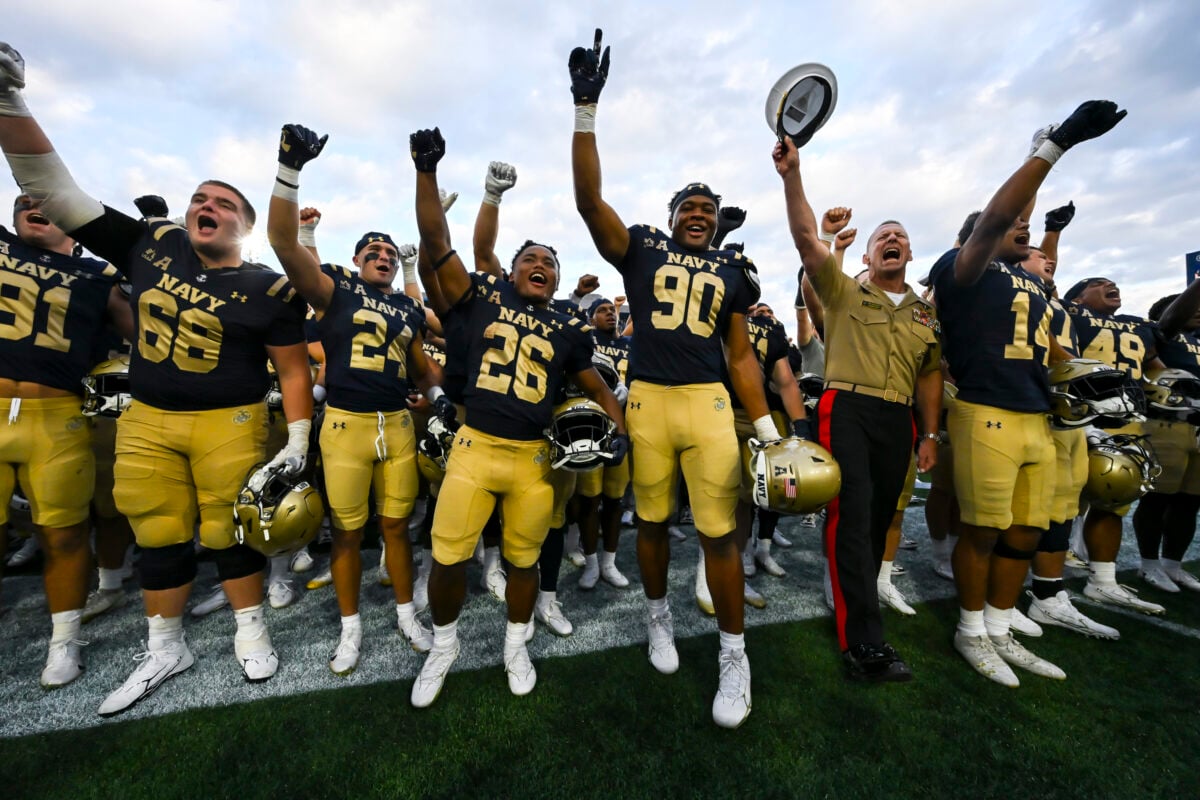Sep 5, 2026; Annapolis, Maryland, USA; United States Naval Academy superintendent Marine Corps Lieutenant General Michael J. Borgschulte and the Navy Midshipmen team celebrate after defeating Towson Tigers at Navy-Marine Corps Memorial Stadium. Mandatory Credit: Tommy Gilligan-Imagn Images