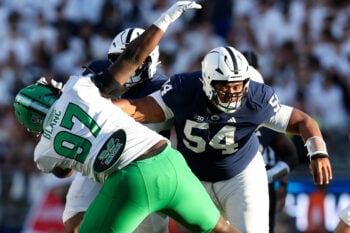 Sep 5, 2026; University Park, Pennsylvania, USA;  Penn State Nittany Lions offensive linesman Vaea Ikakoula (54) blocks Marshall Thundering Herd defensive tackle Nate Blanc (97) during the fourth quarter at West Shore Home Field at Beaver Stadium.  Mandatory Credit: Matthew O'Haren-Imagn Images