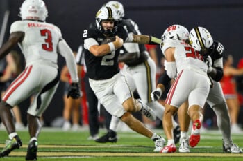 Sep 5, 2026; Nashville, Tennessee, USA;  Vanderbilt Commodores quarterback Jared Curtis (2) scrambles against the Austin Peay Governors during the second half at FirstBank Stadium.  Mandatory Credit: Steve Roberts-Imagn Images