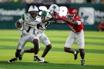 Sep 5, 2026; Honolulu, Hawaii, USA;  Hawaii Rainbow Warriors running back DeVon Rice (1) scrambles through the UNLV Rebels defense during the fourth quarter at the Clarence T.C. Ching Athletics Complex.  Mandatory Credit: Marco Garcia-Imagn Images